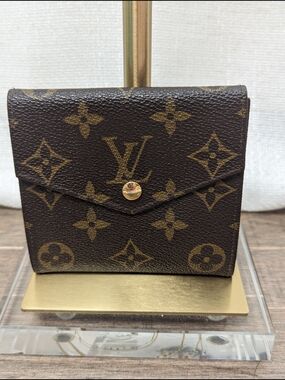 100% Authentic Louis Vuitton Victorine Monogram Wallet W/COA